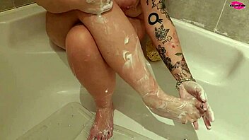 Horny girlfriend gives her man a footjob and gets her feet washed