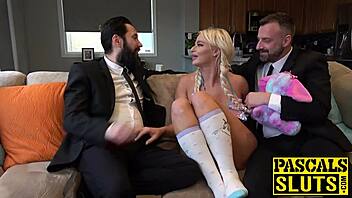 A hot British MILF in a submissive role, taken by two dominants